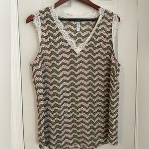 Women’s dressy tank top - size L Pink flowers with green background